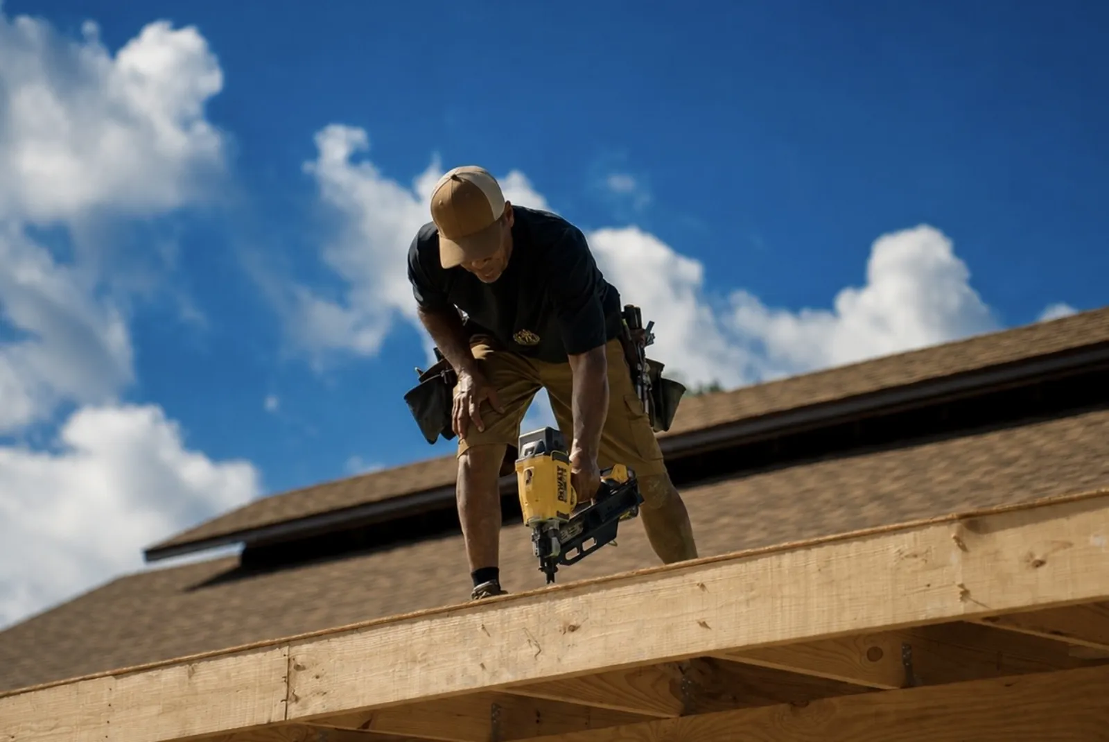 Home remodeling in Davenport, FL · FTK carpenter fastening framing on a project