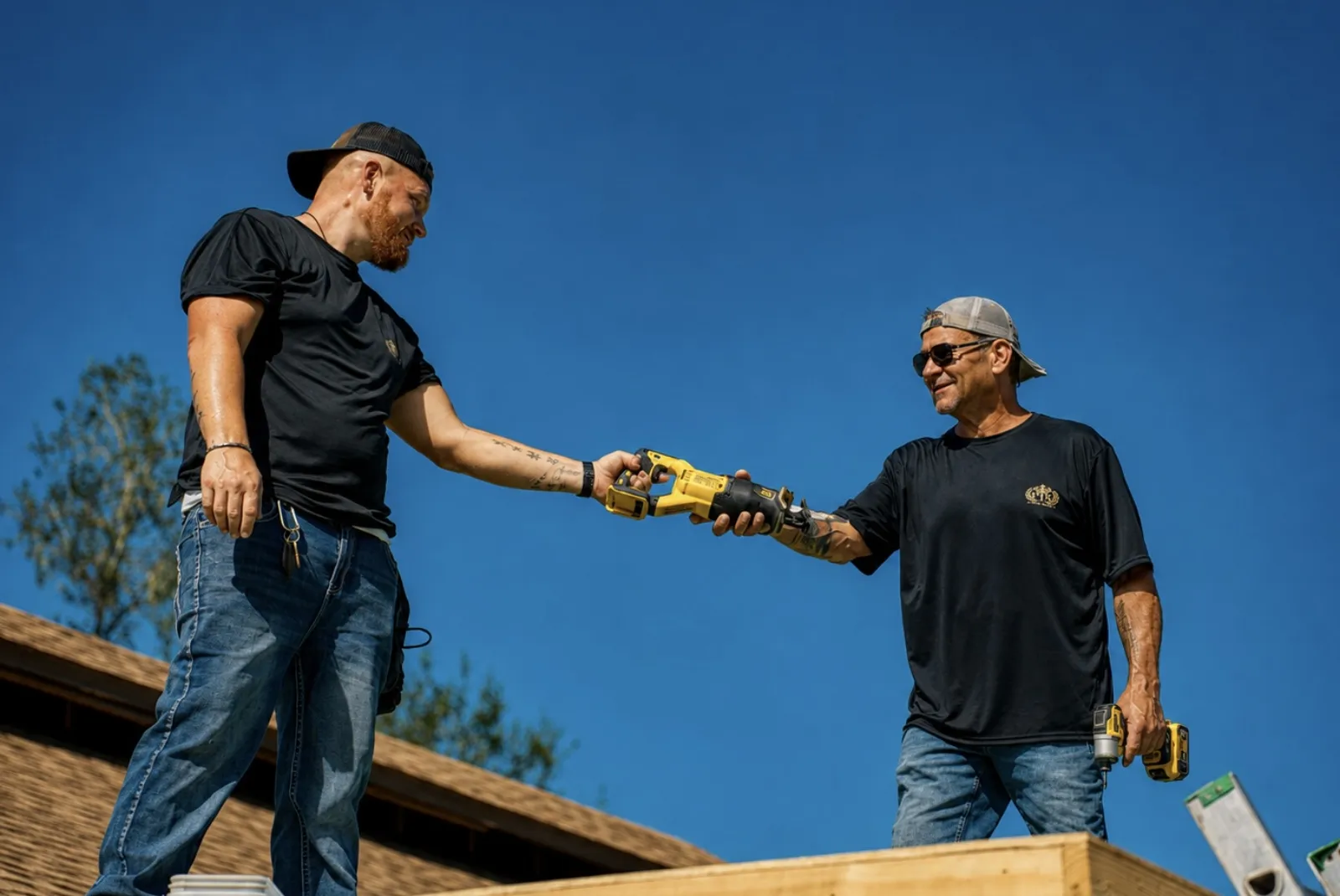 Home remodeling in Haines City, FL · FTK crew passing a tool during a project